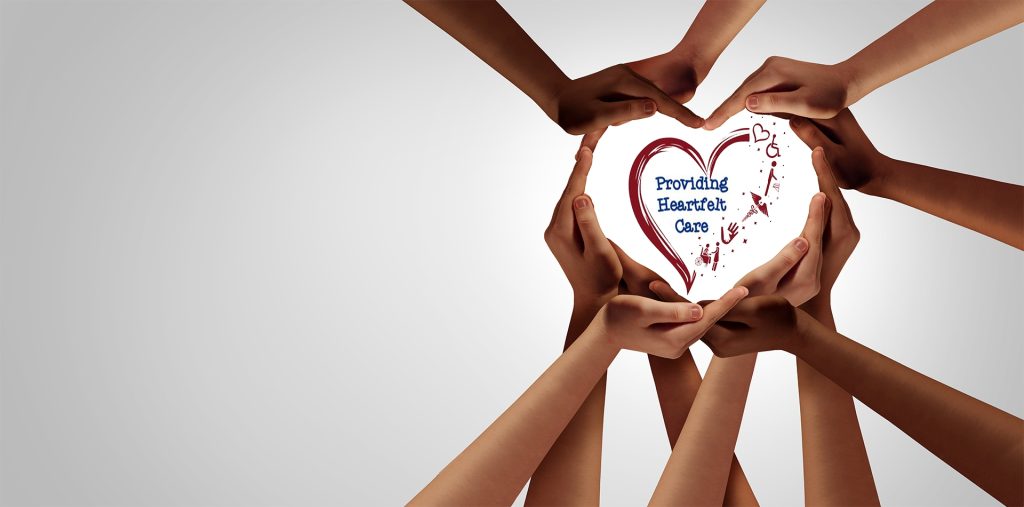Hands forming a heart with The Servants Hand logo